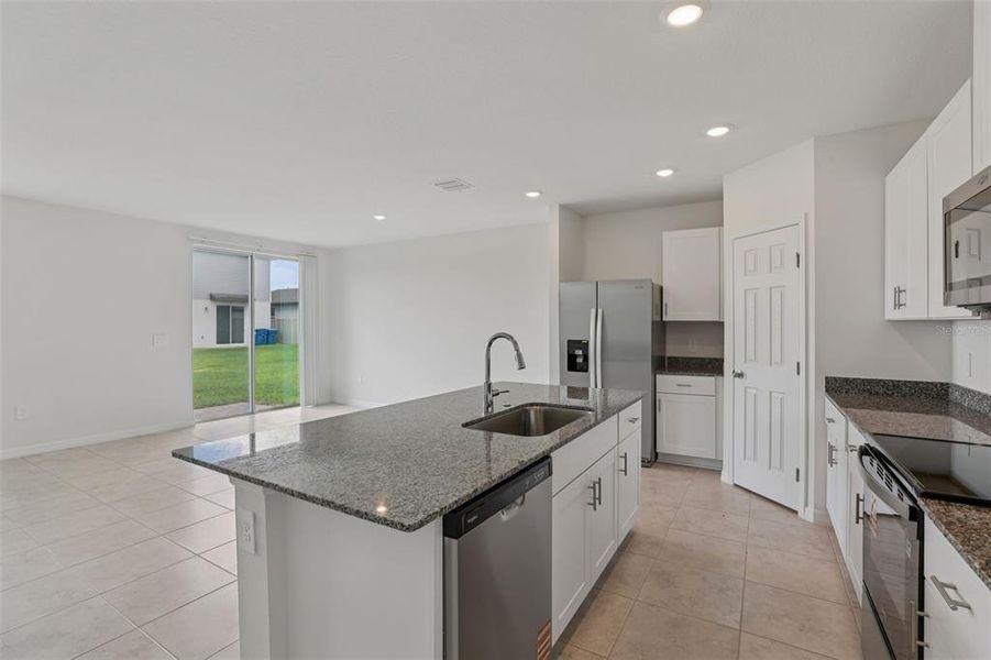 Furnished interior view inside a new home in Lawson Dunes - Signature Series, Haines City (Image 6). Furnished interior view inside a new home in Lawson Dunes - Signature Series, Haines City (Image 6).