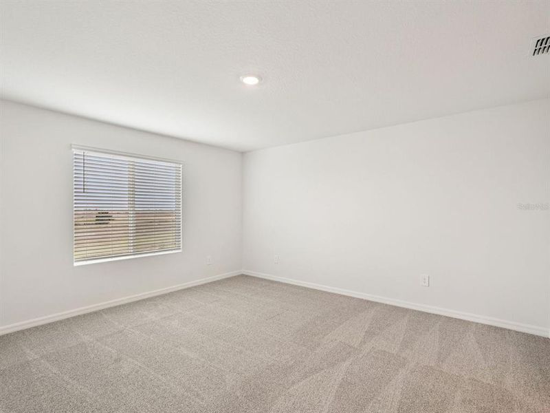 Spacious, unfurnished interior of a new home in Coasterra - Premier Series, Palmetto (Image 30).