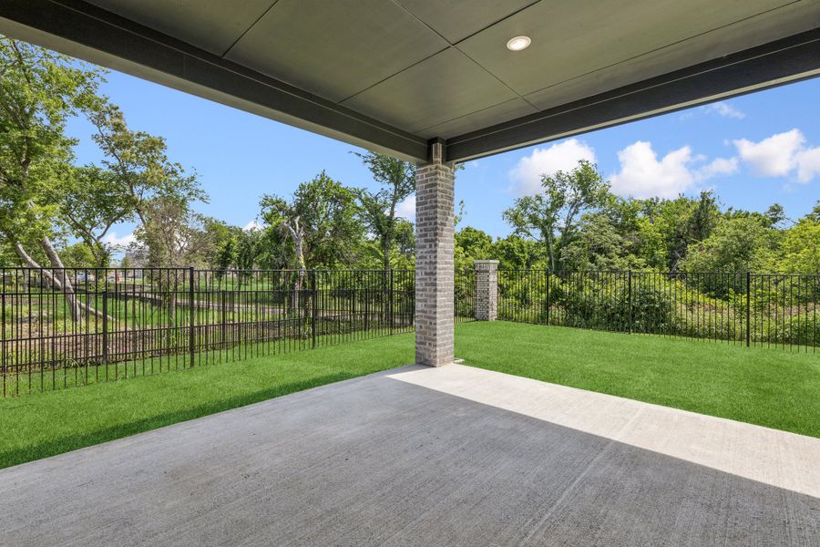 Covered Patio in the Da Vinci II home plan by Trophy Signature Homes – REPRESENTATIVE PHOTO Covered Patio in the Da Vinci II home plan by Trophy Signature Homes – REPRESENTATIVE PHOTO
