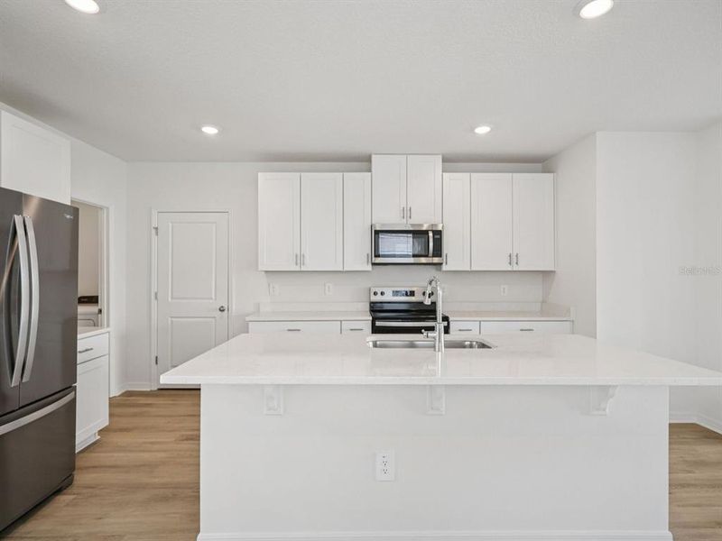 Furnished interior view inside a new home in Oakfield Trails - Premier Series, Parrish (Image 5).