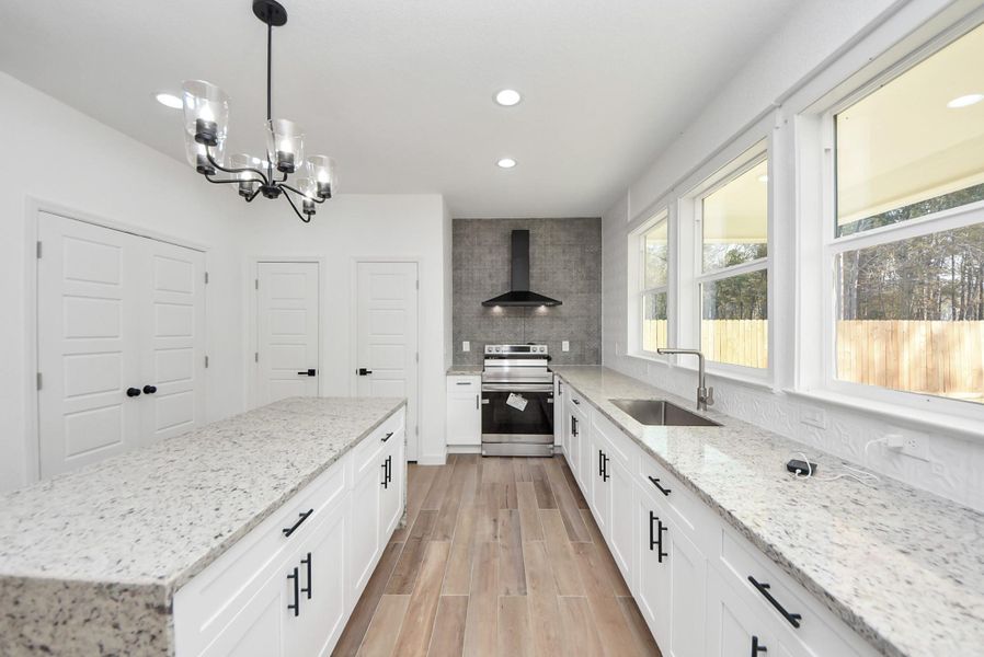 Furnished interior view inside a new home in , Conroe (Image 14).