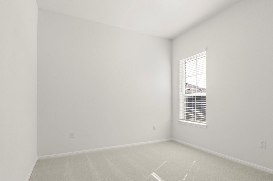 Unfurnished room with baseboards and carpet floors