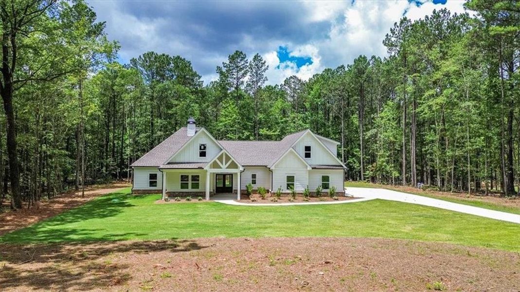 Front exterior of a new home in , Social Circle, GA, highlighting curb appeal (Image 24). Front exterior of a new home in , Social Circle, GA, highlighting curb appeal (Image 24).