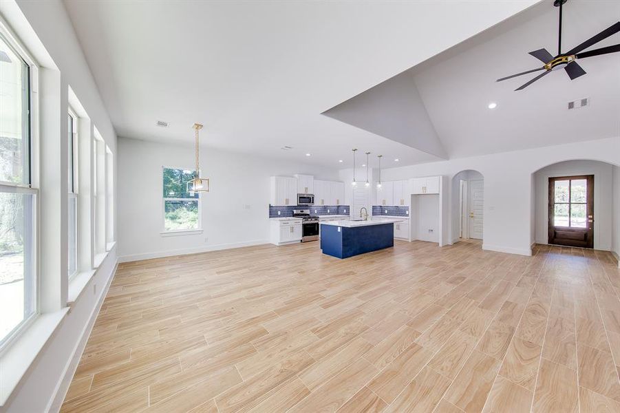 With plenty of sunlight pouring in and easy access to outdoor living, this dining area becomes the ideal spot for casual family meals or special gatherings, all while taking in the beauty of the surrounding landscape.