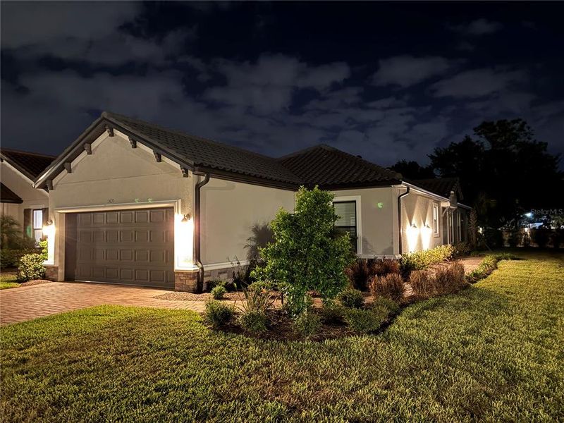 Front exterior of a new home in , Wesley Chapel, FL, highlighting curb appeal (Image 29).