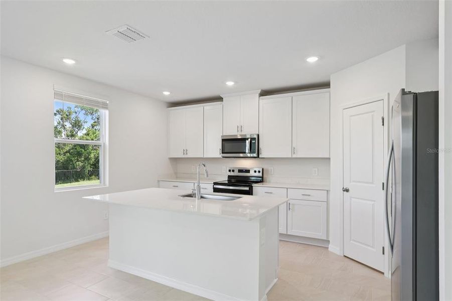 Furnished interior view inside a new home in Crosswinds - Signature Series, Haines City (Image 8).