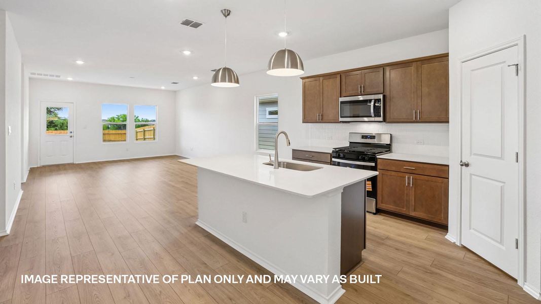 Representative furnished interior of a home built from the The Kendall by D.R. Horton in Valverde, Bastrop (Image 6).