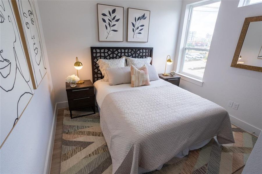 Bedroom with wood-type flooring