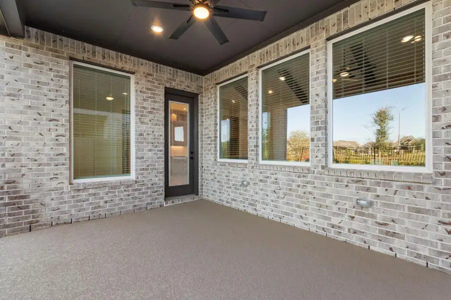 Exterior details and patio area of a home in Elyson, Katy (Image 3). Exterior details and patio area of a home in Elyson, Katy (Image 3).
