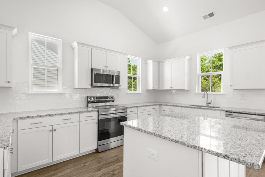 Furnished interior view inside a new home in Downtown Loris Homes, Loris (Image 8).