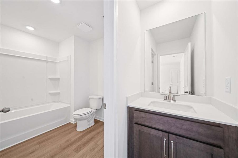 Furnished interior view inside a new home in Eastlyn Crossing, Flowery Branch (Image 5).