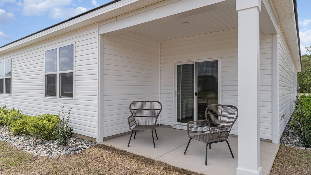Exterior details and patio area of a home in Sandridge Park, Little River (Image 3). Exterior details and patio area of a home in Sandridge Park, Little River (Image 3).
