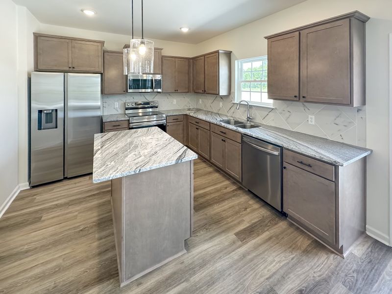 Furnished interior view inside a new home in Doctor's Creek, Ludowici (Image 7).