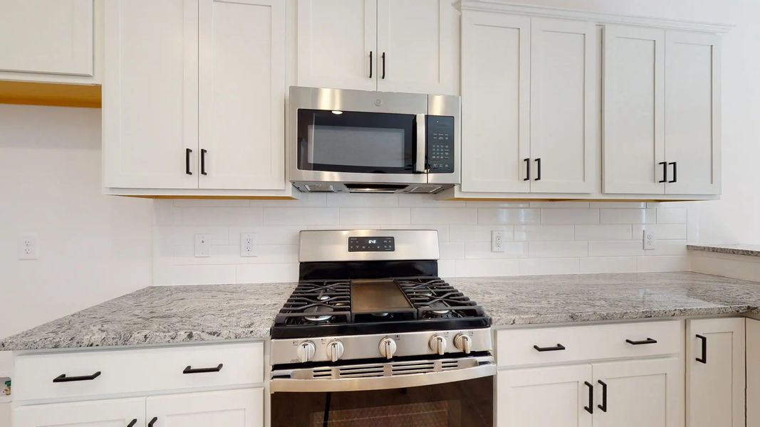 Representative furnished interior of a home built from the Catherine A by JC Jackson Homes,LLC in Heritage Pointe, Newport (Image 10).