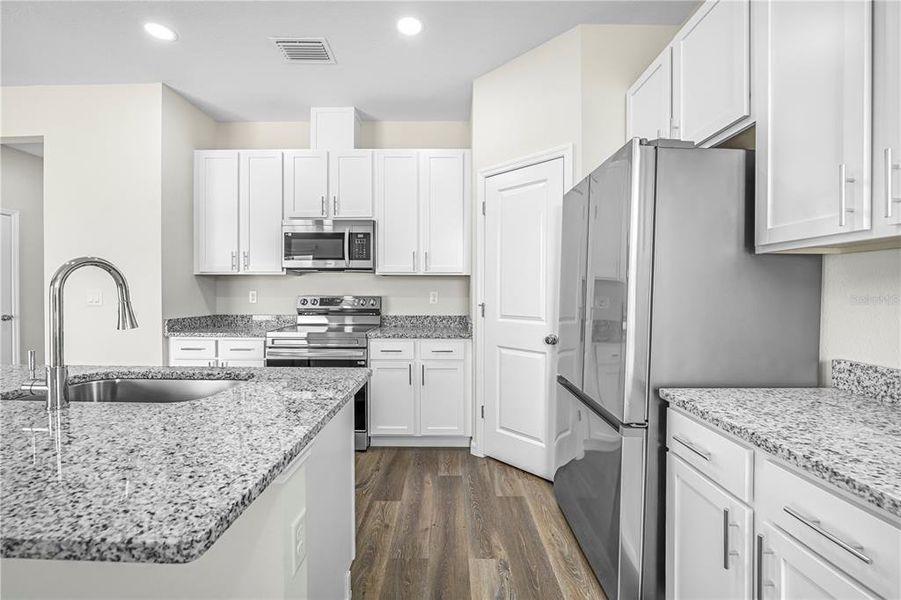 Furnished interior view inside a new home in , Weeki Wachee (Image 8).