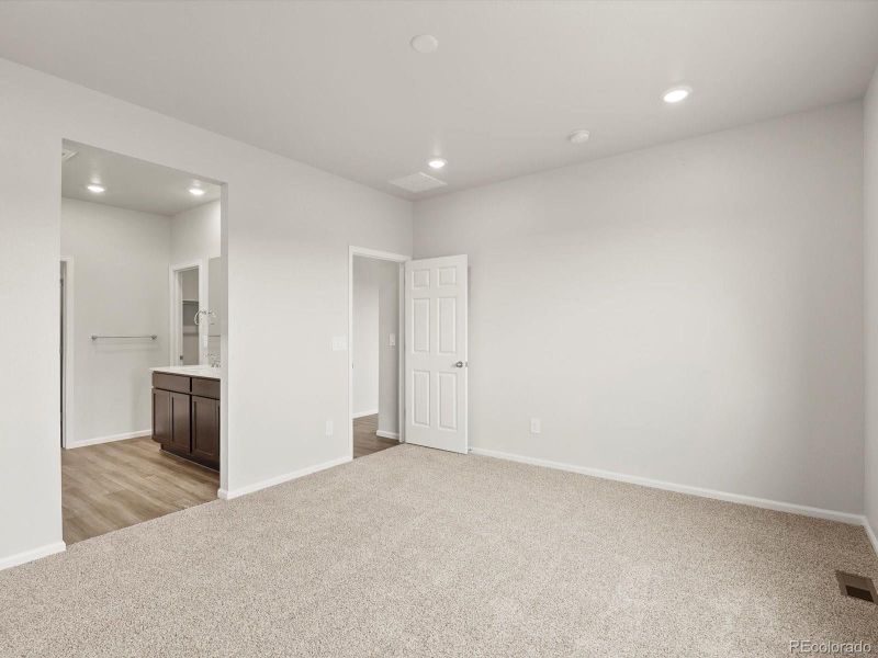 Spacious, unfurnished interior of a new home in Poudre Heights: The Lakes Collection, Windsor (Image 12).