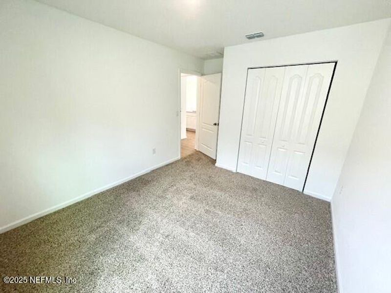 Spacious, unfurnished interior of a new home in Grand Reserve, Bunnell (Image 46).