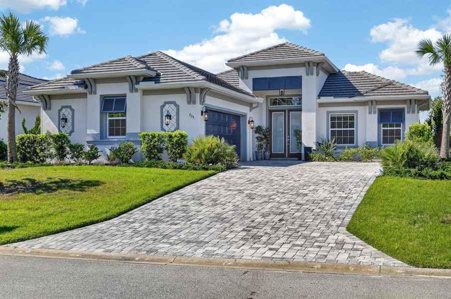 Front exterior of a new home in , Palm Coast, FL, highlighting curb appeal (Image 28).