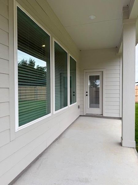 Exterior details and patio area of a home in Grande Estates, Bertram (Image 21).