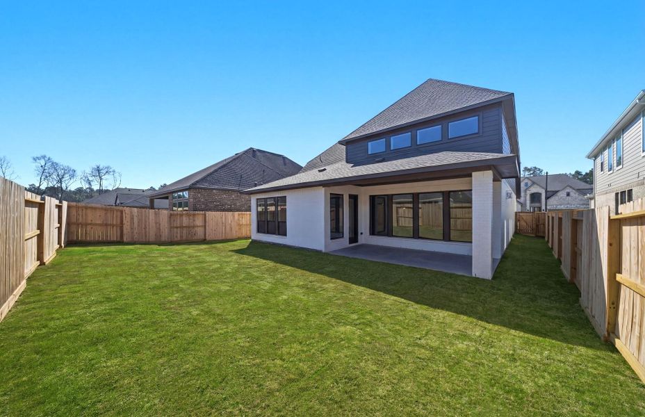 Exterior details and patio area of a home in The Highlands 55′, Porter (Image 4).