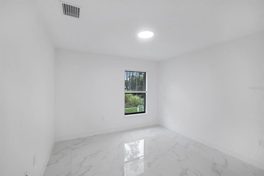 Spacious, unfurnished interior of a new home in , Lehigh Acres (Image 30).