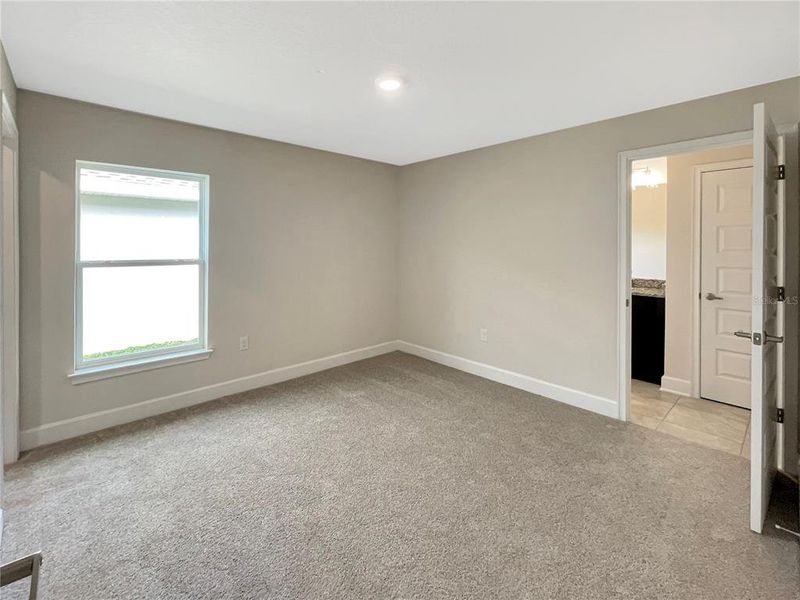 Spacious, unfurnished interior of a new home in Harmony Central, St. Cloud (Image 14).