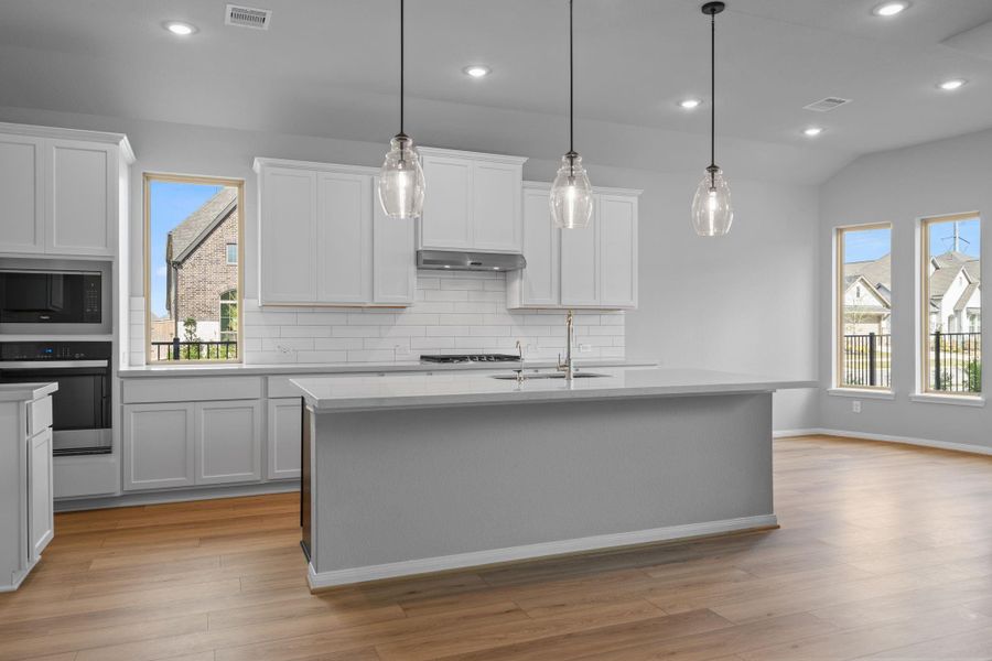 Furnished interior view inside a new home in Bridgeland 55', Cypress (Image 10).