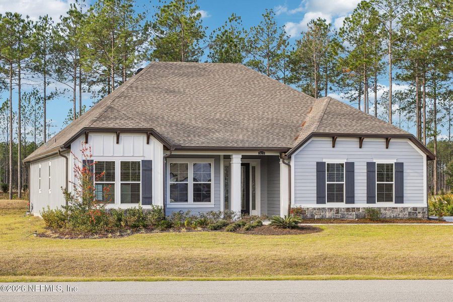 Front exterior of a new home in , Hilliard, FL, highlighting curb appeal (Image 24). Front exterior of a new home in , Hilliard, FL, highlighting curb appeal (Image 24).