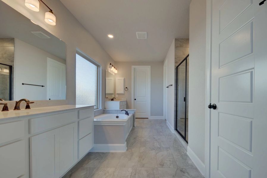 Representative furnished interior of a home built from the Barnett by Ashton Woods in Sunday Creek at Kinder Ranch, San Antonio (Image 8).
