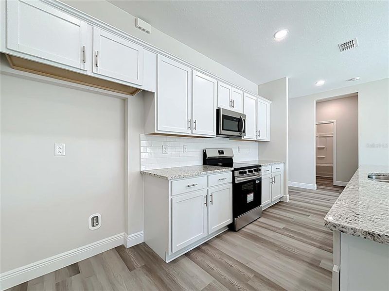 Furnished interior view inside a new home in , North Port (Image 11).