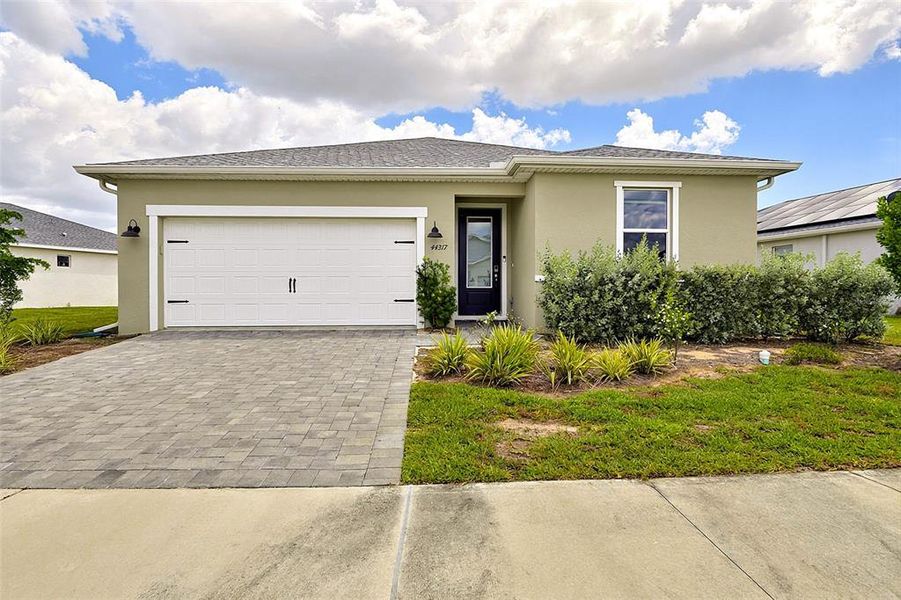 Front exterior of a new home in , Punta Gorda, FL, highlighting curb appeal (Image 1). Front exterior of a new home in , Punta Gorda, FL, highlighting curb appeal (Image 1).