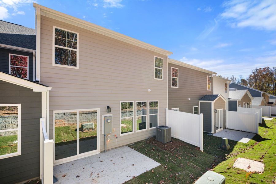 Exterior details and patio area of a home in Harbor Crossing, Greensboro (Image 4).
