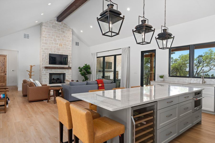 This is a TO BE BUILT custom home on 6.75 acres in Rainbow Ranch, Wimberley TX.