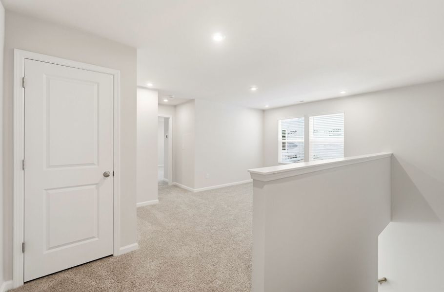 Spacious, unfurnished interior of a new home in Stonesummit at Reedy Creek, Charlotte (Image 17).