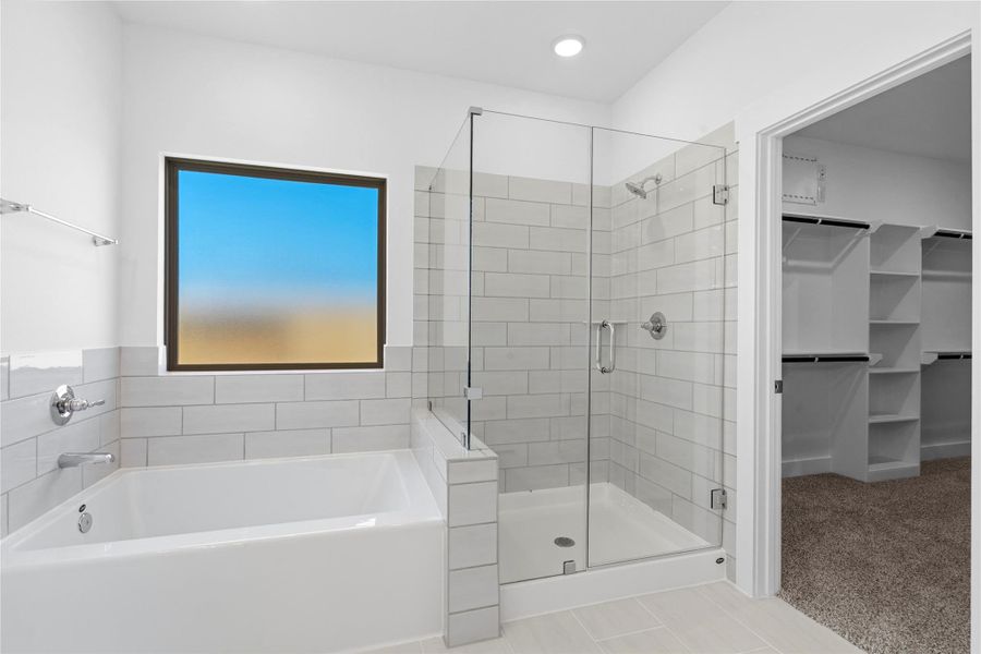 Escape to a serene retreat in this beautifully designed primary bath, crafted to balance modern luxury with calming comfort