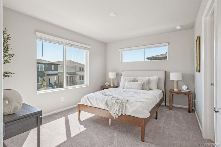 Furnished interior view inside a new home in Woodrose at Painted Prairie, Aurora (Image 10).