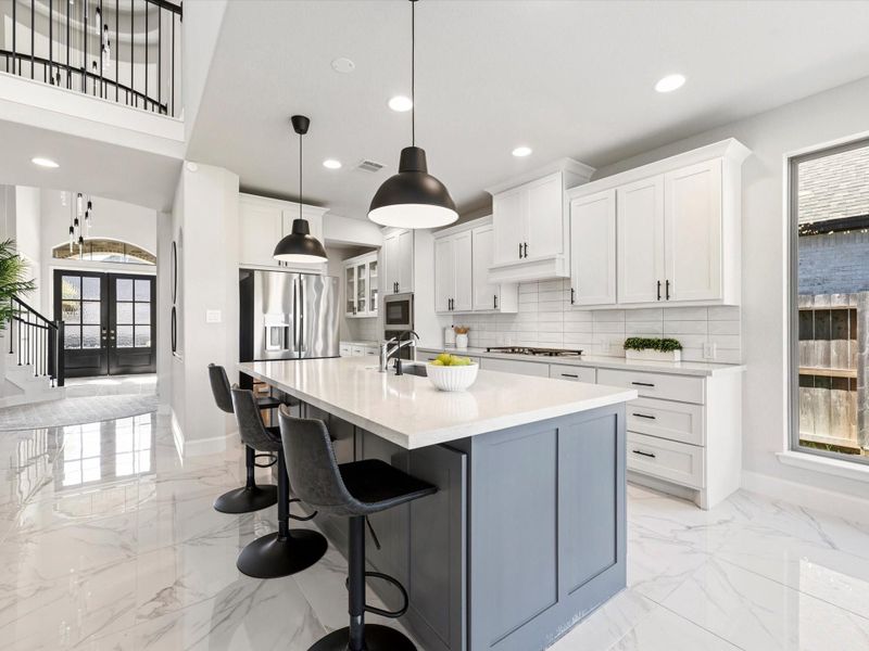 Nice deep seating at the kitchen island. The front of the island features real storage cabinets. (not just decorative panels)