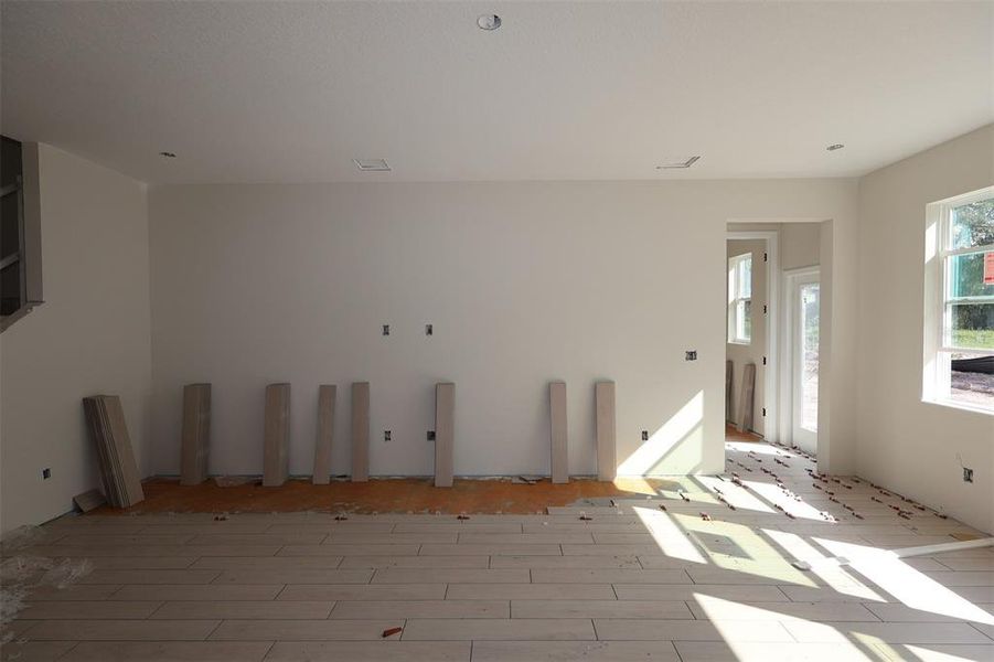 In-progress construction of a new home in Eden at Crossprairie, St. Cloud, FL (Image 12).