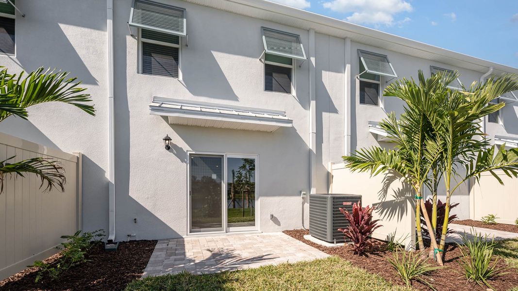 Exterior details and patio area of a home in Tortuga Cay, Satellite Beach (Image 2).