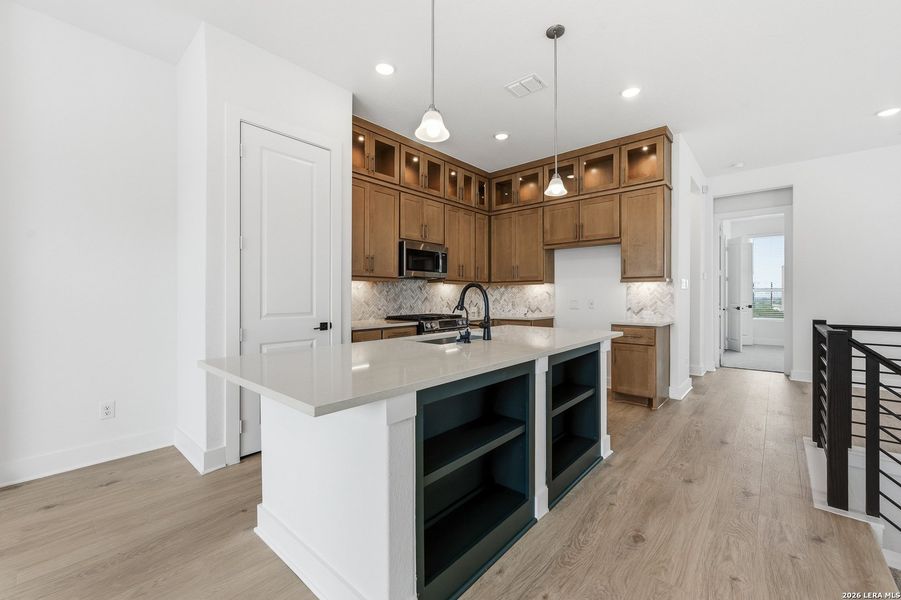 Furnished interior view inside a new home in Centero at Stone Oak, San Antonio (Image 11).