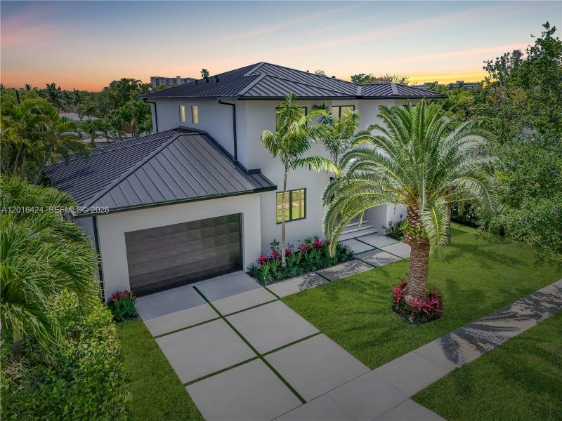 Front exterior of a new home in , North Miami, FL, highlighting curb appeal (Image 2).