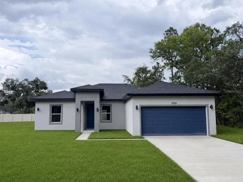Front exterior of a new home in , Dunnellon, FL, highlighting curb appeal (Image 1). Front exterior of a new home in , Dunnellon, FL, highlighting curb appeal (Image 1).