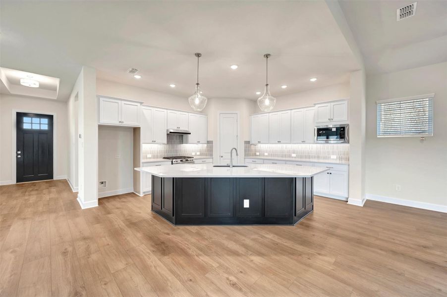 Furnished interior view inside a new home in Riceland - Enclave Row Collection, Mont Belvieu (Image 5).