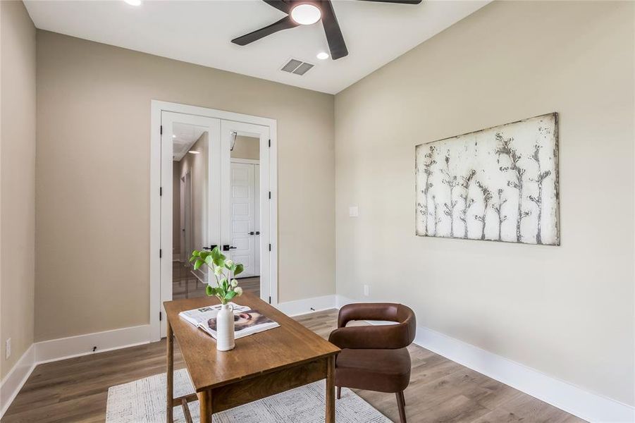 Another view of the home office with French doors Another view of the home office with French doors