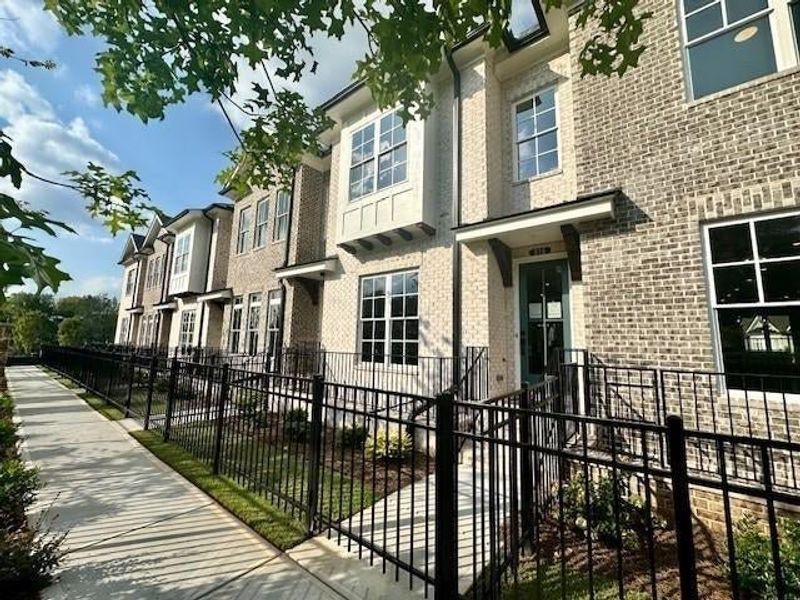 This home will have a fenced in front courtyard. *Please note pictures shown are of the Jacobsen II floorplan but are not of the actual home.