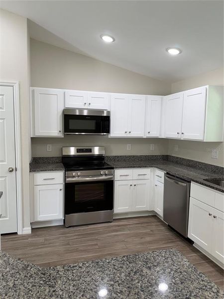 Furnished interior view inside a new home in , Port Charlotte (Image 9).