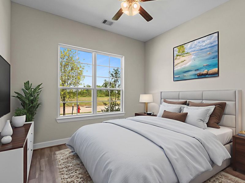 Your guests will feel right at home in this spacious Portico guest bedroom, featuring plenty of natural light, generous closet space, and a warm, inviting layout designed for comfort and privacy. Image depicts home as-is virtually staged.