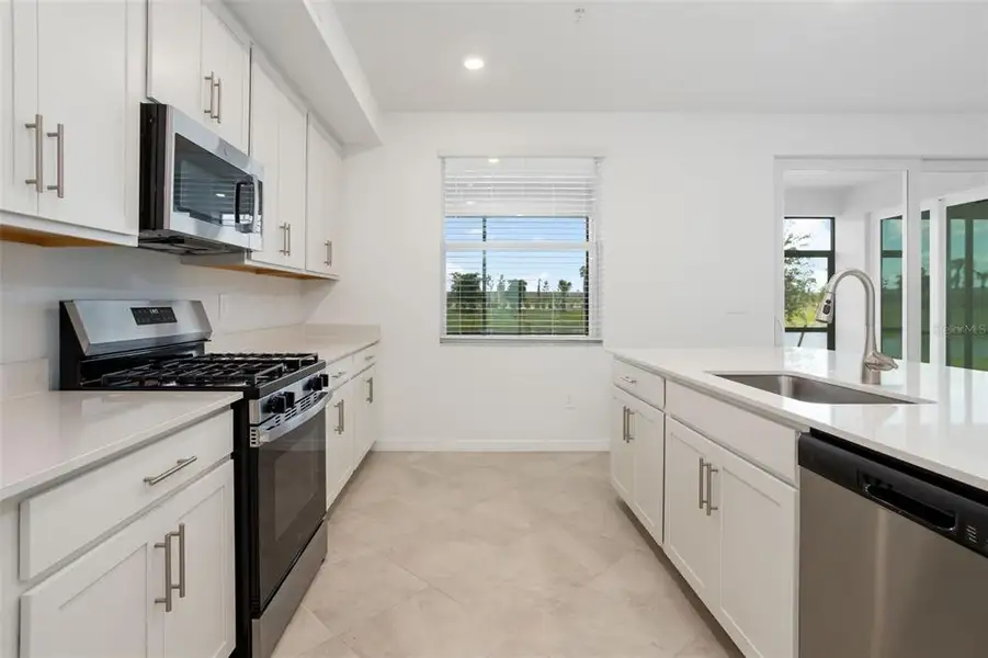 Furnished interior view inside a new home in Calusa Country Club, Lakewood Ranch (Image 16).