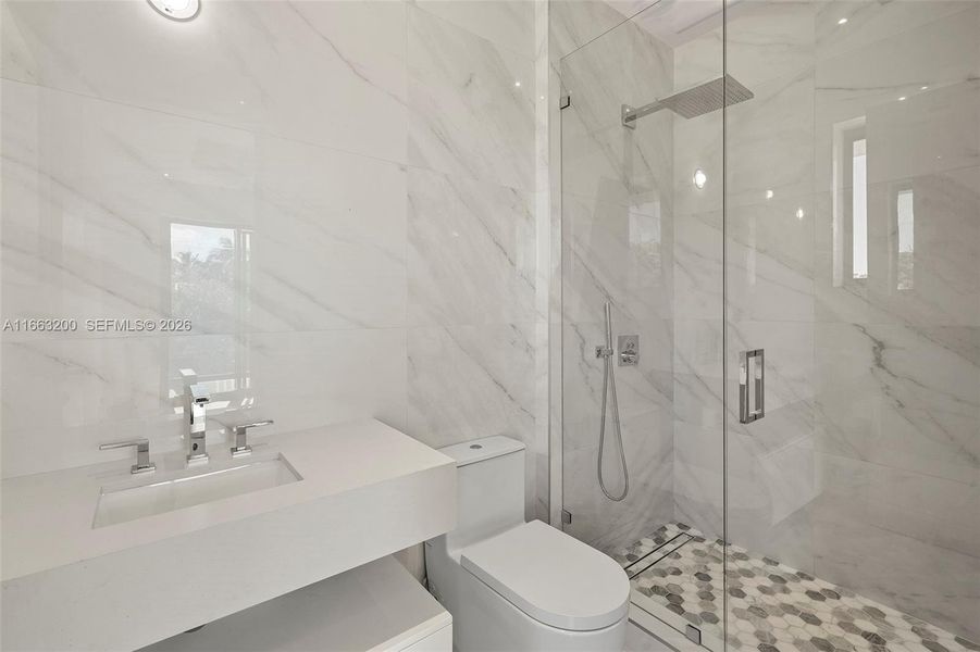 Furnished interior view inside a new home in , Miami Beach (Image 15). Furnished interior view inside a new home in , Miami Beach (Image 15).