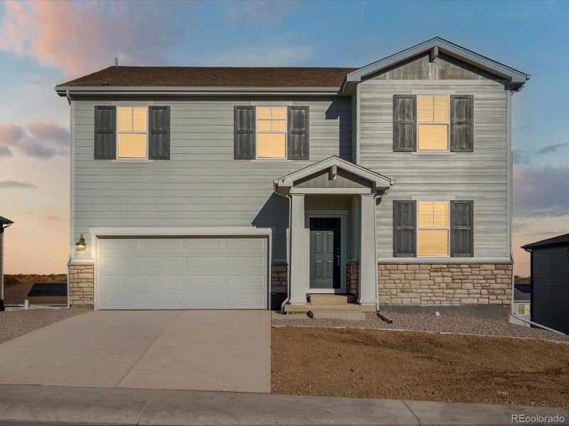 Front exterior of a new home in , Windsor, CO, highlighting curb appeal (Image 2).